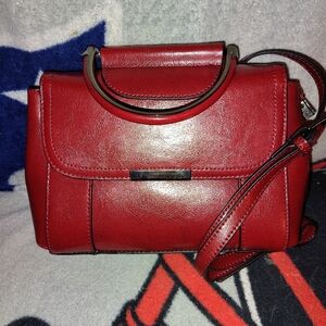 Red genuine leather purse.